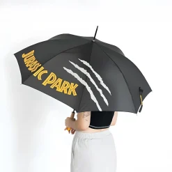 Grupo Erik Accessoires^Jurassic Park Regenschirm mit Bernsteinfossil-Griff