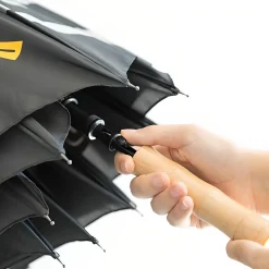 Grupo Erik Accessoires^Jurassic Park Regenschirm mit Bernsteinfossil-Griff